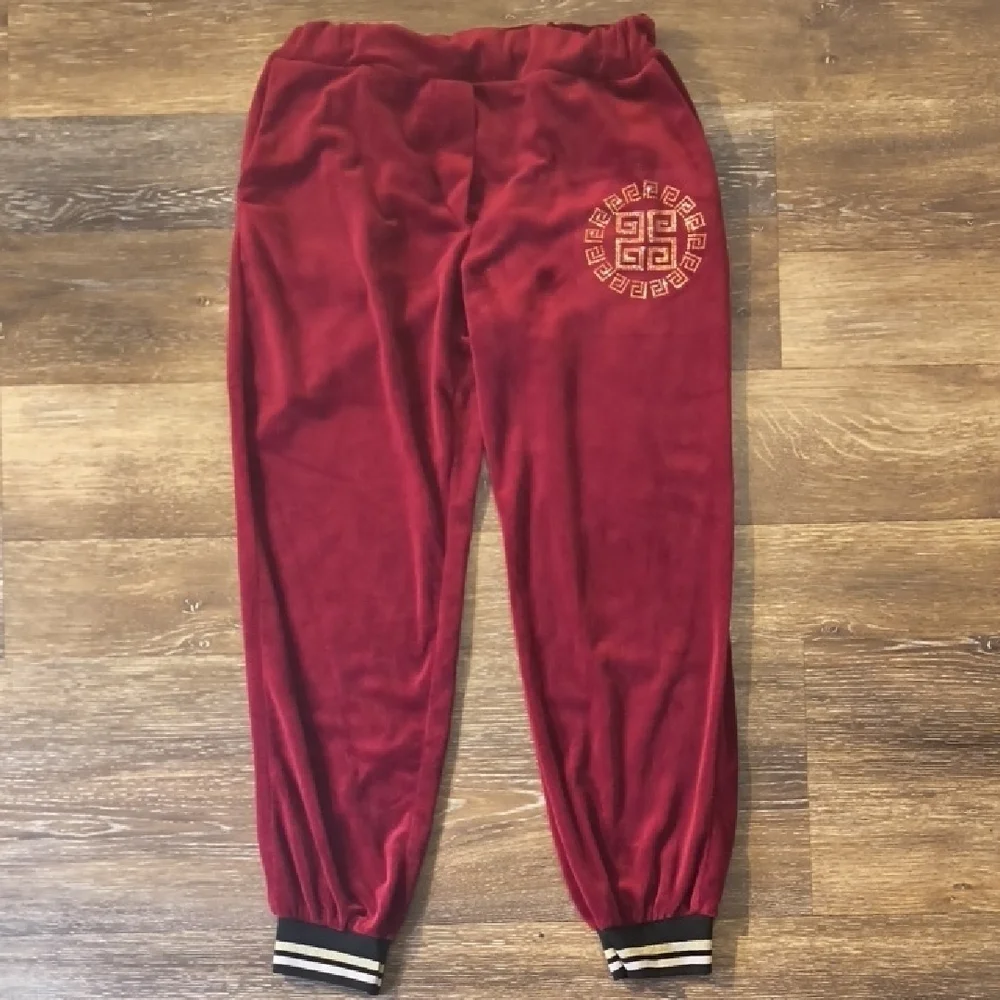 Sofia Vergara Red Velour Jumpsuit Gold Details